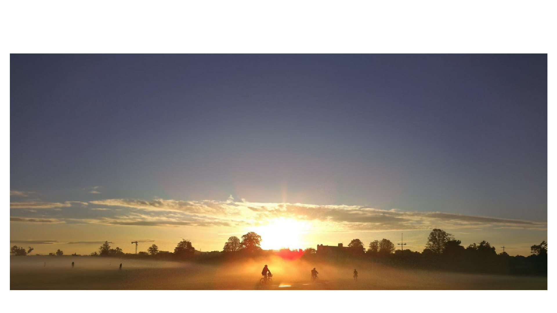 Cambridgeshire community at sunset - cyclists enjoying outdoor activities